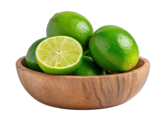 Bowl of bright green, whole & halved limes