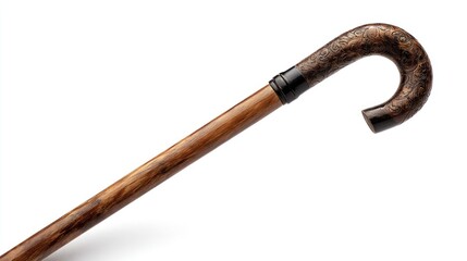Fototapeta premium Carved wooden walking cane with a hooked handle resting against a stark white background