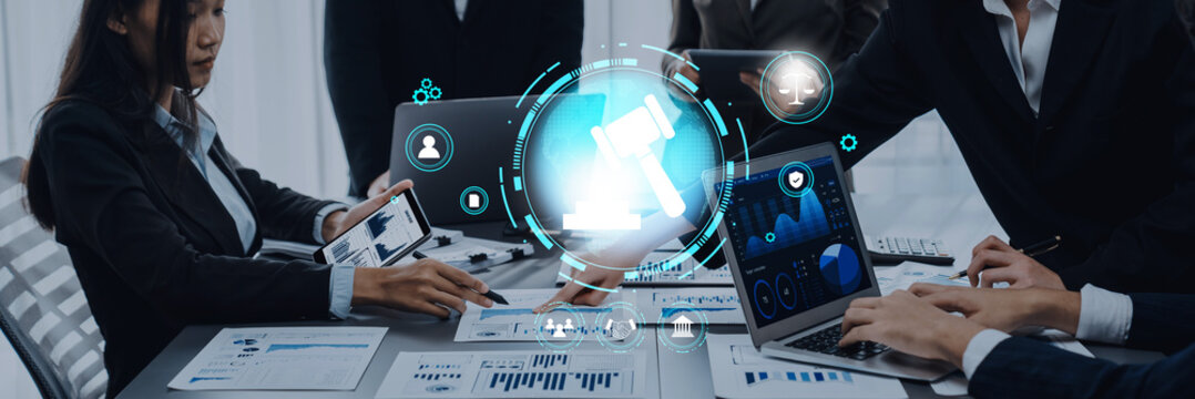 A modern business meeting with professionals discussing data analysis and collaboration. Digital technology integration enhances communication and productivity. Trope