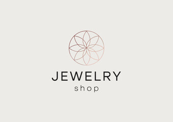 Fototapeta premium This image showcases a sophisticated jewelry shop logo featuring a floral design, elegantly balancing modern elegance with timeless beauty, perfect for branding in luxury markets.