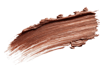 Brown swipe of thick cosmetic substance on black background