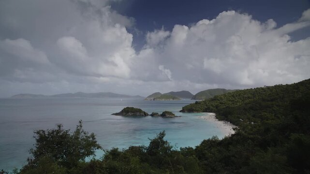 Dramatic clouds above an overlook of Trunk Bay, St. John&rsquo;s, USVI in the mid afternoon