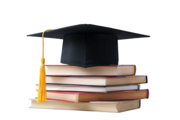 A black graduation cap with a golden tassel sits proudly atop a stack of old academic books