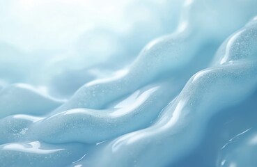 Close up on waves of light blue gel or cream. Glossy substance has small bubbles and sparkles within its structure. Soft lighting illuminates its undulating surface creating cool, refreshing look.
