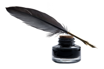 An antique black feather quill pen with a gold nib rests upon a clear glass inkwell