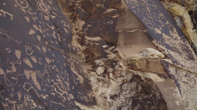 A close up panning shot of petroglyphs at Newspaper Rock near Canyon Lands National Park, Utah