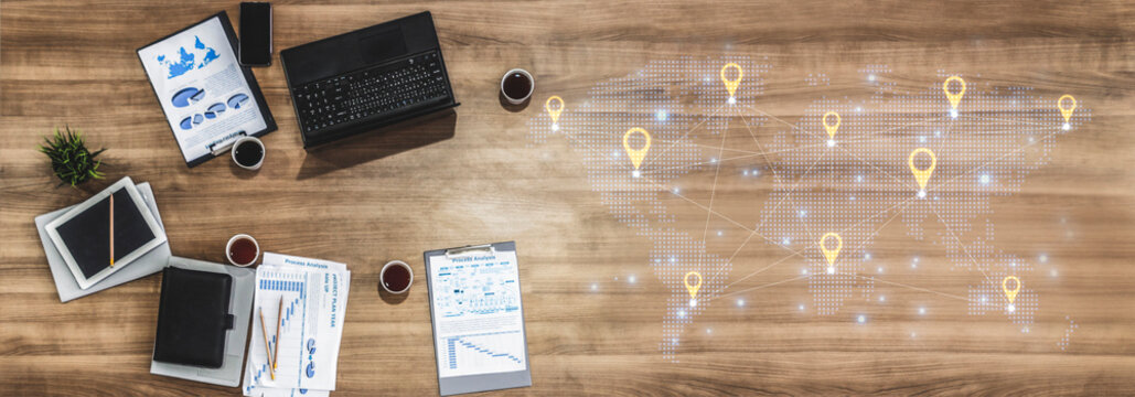 Concept of a global logistics network with location pins on a world map. This represents an international supply chain and distributed business locations for worldwide reach. Fermion