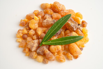 Frankincense or olibanum aromatic resin isolated on white background used in incense and perfumes.