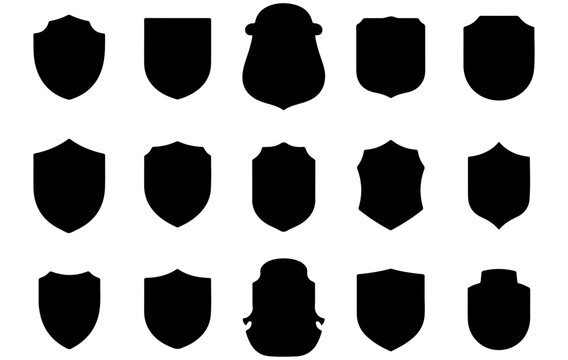 Assorted black shield and badge silhouettes, featuring a variety of distinct shapes and classic designs ideal for security, protection, and heraldic emblem graphics