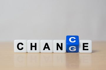 Flipping of dice to adjust between change wording to chance wording for growth attitude and positive mindset of personal development concept