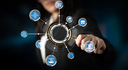 A businesswoman interacts with a digital interface, highlighting global technology connections in a modern corporate setting, representing innovation and communication. Crux