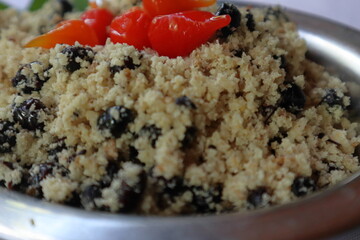 A dish of farofa de iça, a typical delicacy from the Paraíba Valley made with iça ants.