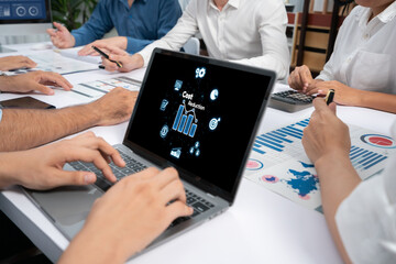 Cost reduction, cost saving concept shown on computer screen brisk, corporate business efficiently...