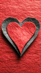 Layered Felt Hearts with Red and Dark Gray Colors on a Vibrant Red Textured Background