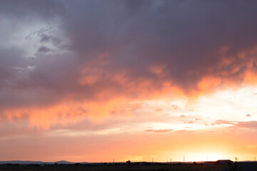 Sunrise or sunset cumulus clouds in the sky