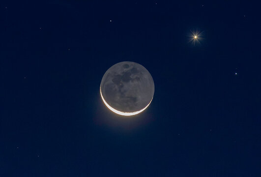 Dark side of the Moon with Venus and Regulas beside it
