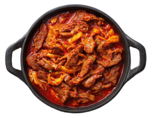 Stewed beef with peppers in a black ceramic pot, overhead