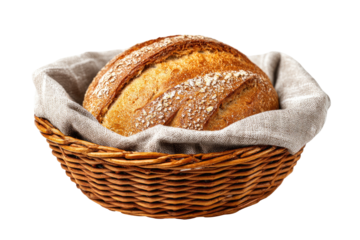 Crusty bread sits nestled in cloth in a woven basket.