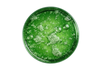 Green liquid with bubbles in a clear circular container