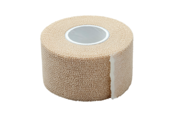 Beige roll of bandage/tape, angled, against a black backdrop