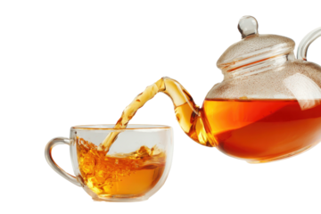 Tea pouring from a clear pot into a glass cup