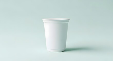 Plain White Disposable Cup Mockup on a Light Blue Background