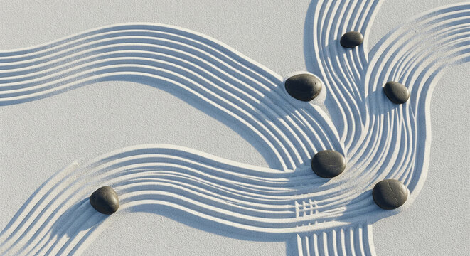 A tranquil Japanese zen garden with raked sand and smooth black stones, a perfect concept for peace, mindfulness, meditation, and balance