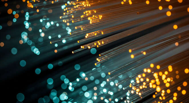 A close-up of glowing fiber optic cables in orange and teal, a perfect abstract concept for high-speed data, communication, and modern technology - Powered by Adobe