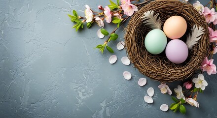 Easter nest with colorful eggs and blooming cherry blossom branches