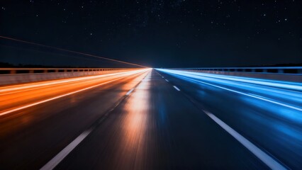 Nighttime highway with light trails from moving vehicles under a starry sky