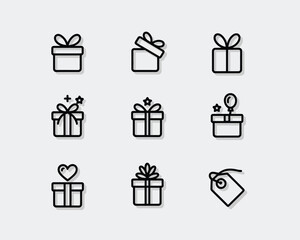 Minimalist black line icons of gift boxes and tag present ribbon