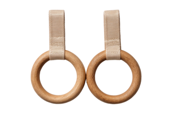 Two wooden gymnastic rings, beige straps against black