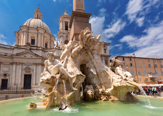 Obraz premium Baroque Fountain of the Four Rivers with SantAgnese in Agone in Rome, Italy