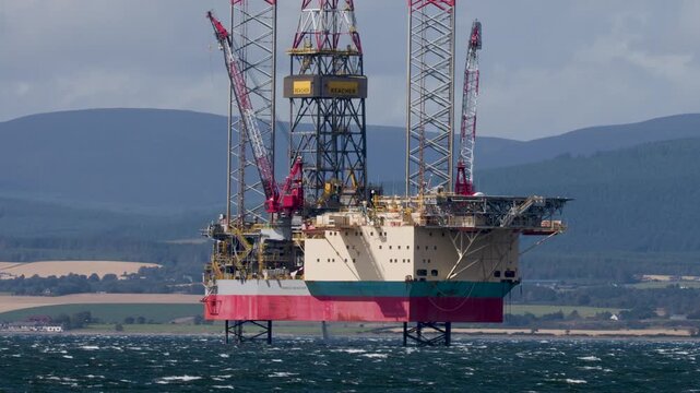 Offshore Oil Rig in Cromarty Bay with Distant Highlands