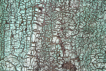 The texture of old cracked green paint. Abstract Background Texture