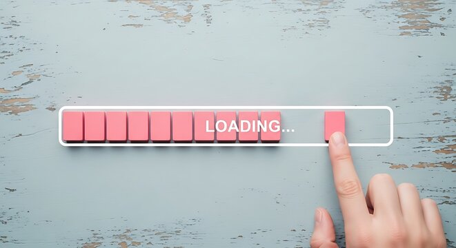 Loading progress bar concept with hand touching the loading bar on table