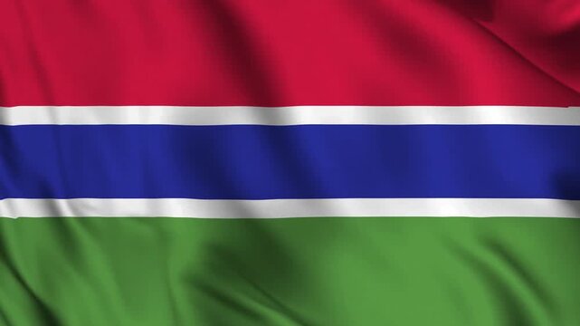Animation of the Gambia flag waving in the wind, symbolizing peace, hospitality, and the nation&rsquo;s strong cultural identity along the Gambia River.
