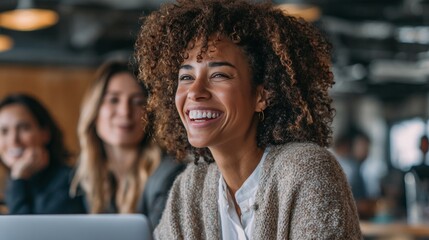 Joyful woman engaged with friends in a modern workspace lifestyle photo warm atmosphere