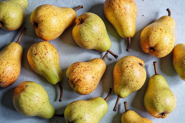 Ripe juicy pears on grey table, flat lay. Space for text. 3d rendering.