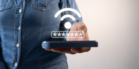 A woman is holding a cell phone with a wifi password on it. The wifi password is displayed on the screen