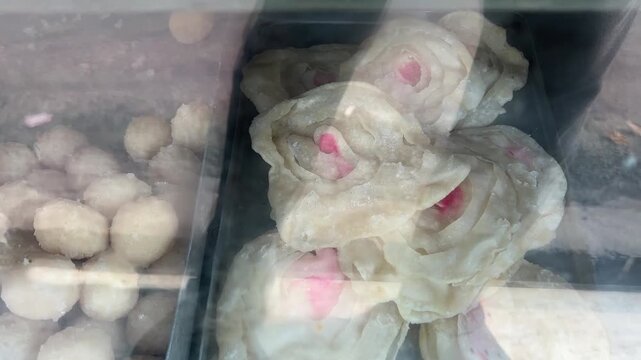 Cheap Bengali sweets sold in a street shop in Kolkata