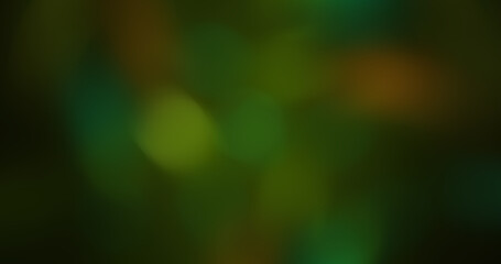 Abstract Green and Yellow Bokeh Background with Soft Blurred Lights Creating a Smooth and Vibrant Natural Dark Texture for Overlays