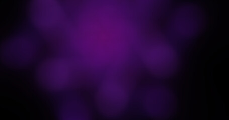 Abstract blurred purple bokeh lights on a dark background, soft focus illumination texture for festive and vibrant design projects
