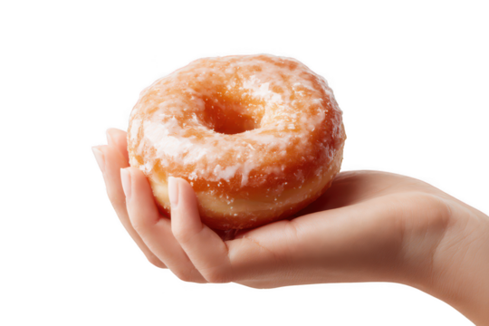 Hand holding a glazed donut isolated on transparent background