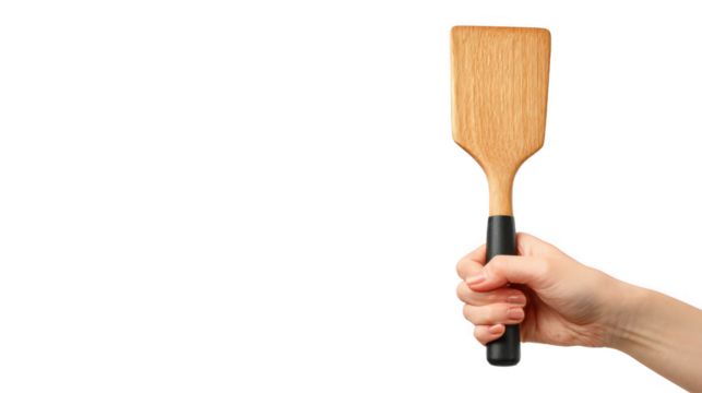 Hand holding wooden spatula isolated on transparent background