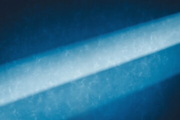 Blur light rays. Defocused neon glow. Sci-Fi illumination. Bokeh navy blue color gradient ultraviolet radiance flare on dark black futuristic abstract copy space background.