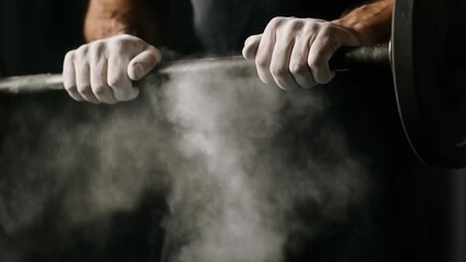 financial success freedom performance concept. Strong hands gripping a barbell covered in chalk dust. - Powered by Adobe