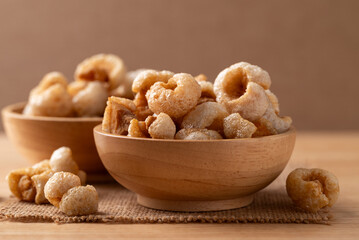Pork rind in a wooden bowl, Northern Thai food