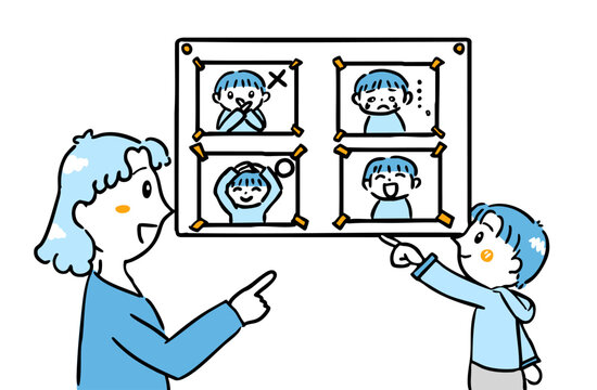 感情カードを使って気持ちを学ぶ子どもと支援員