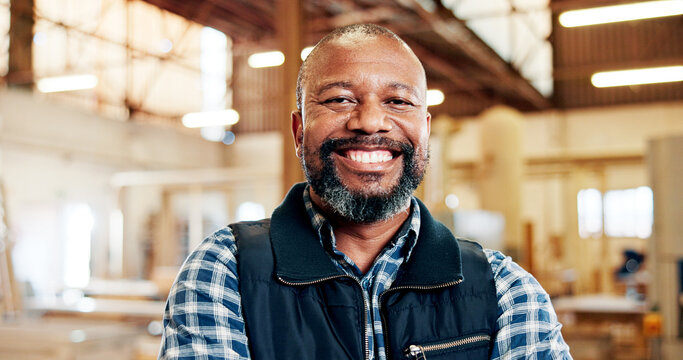 Happy, black man and portrait with woodwork for carpenter or furniture business in workshop. Male person, artisan or timber craft with smile for wood repair, manufacturing or lumber production - Powered by Adobe